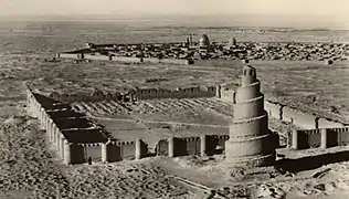 Full aerial view of the mosque, with Al-Askari Shrine in the background