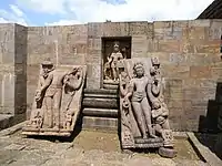 Statues in porch, Avalokiteshvara at centre.