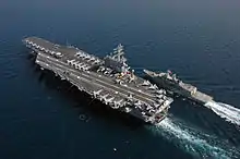 Ronald Reagan makes final preparations to provide fuel to the Royal Australian Navy frigate HMAS Ballarat during a Fueling At Sea (FAS) evolution, 21 April 2006