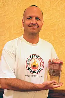 Reed Esau, Founder of SkeptiCamp, receiving James Randi Award for Skepticism in the Public Interest, at TAM 2012