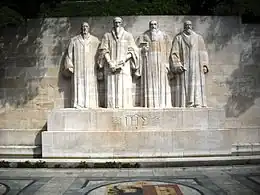 Image 10Statues of William Farel, John Calvin, Theodore Beza, and John Knox, the most influential theologians in developing the Reformed faith, at the Reformation Wall in Geneva (from Calvinism)