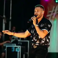 Rolf Sanchez performing on stage (2019)