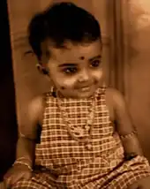 A picture featuring Rekha as an infant in the 1950s.