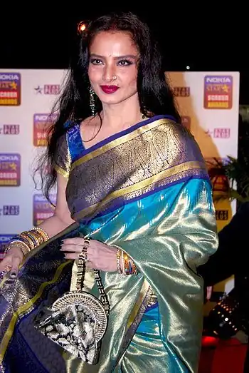 A photograph of Rekha looking towards the camera