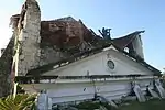 Remains of Loay church post-2013 earthquake