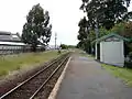 Station and platform looking north-east at the Renall Street level crossing and in the direction of Masterton, before rebuild