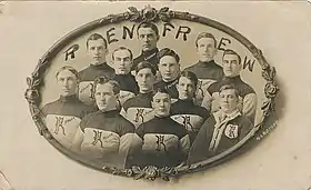 A postcard of an early ice hockey team. The players are shown from the waist up and wear a sweater with the team's logo.