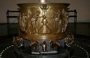 Baptismal font at St Bartholomew's Church, Liège sculpted by Renier de Huy in Liège, Belgium.