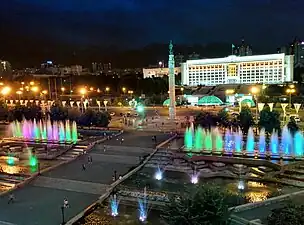 Republic Square at night.