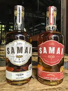 Kampot Pepper Rum spiced with red Kampot pepper (right) produced by Samai Distillery.