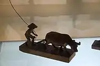 Carving depicting a Filipino farmer and a carabao