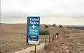 Riddells Road Ring (on far left)  with sign indicating future residential development