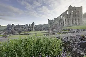 Rievaulx Abbey showing Presbytery (R), South Transept, Chapter House foundations & wall of Infirmary (L)