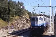 Retired class 1061 locomotive pulling an InterCity from Zagreb, 2004