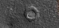 Ring mold crater  This image was named HiRISE picture of the day.  Ring mold craters are caused by a rebound of an ice layer after being struck by an impacting body.