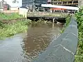 Flowing under one of the world's widest bridges