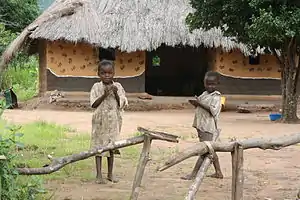 Children outside a house on the road from Pweto to Dubie