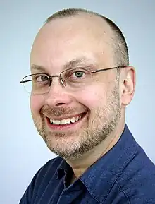 Portrait photograph of Sawyer smiling