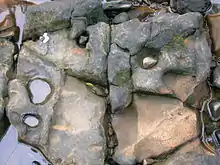 Basins with the eroding pebble in situ. Very low water levels.