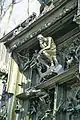 A "Thinker"-like detail above the closed doors of the entrance at Rodin's "Gates of Hell" in front of the National Museum of Western Art