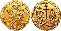 Obverse and reverse of a gold coin, showing Christ enthroned and two crowned rulers jointly holding a cross