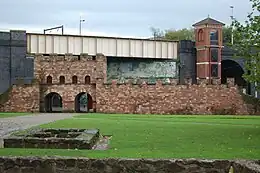 Image 26A reconstructed gateway of Mamucium fort (from History of Manchester)