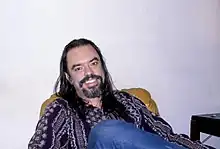 Root Boy Slim relaxing in his Takoma Park, Maryland home in 1980