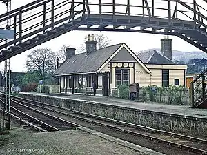 Rothes Railway Station looking south on 27 May 1968, the closure notice is being read.