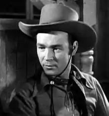 Roy Rogers dressed in cowboy gear.