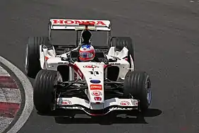 Upon its return to F1 in 2006, Honda continued with virtually the same livery as had been used by the British American Racing team in preceding years. This is Rubens Barrichello driving the Honda RA106 at the 2006 Canadian Grand Prix.