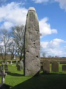 Image 11The Rudston Monolith, almost 26ft high, close to Rudston Parish Church of all Saints (from History of Yorkshire)