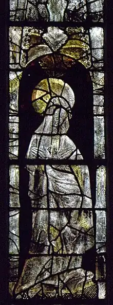 Photo of a stained-glass lancet depicting the Virgin Mary