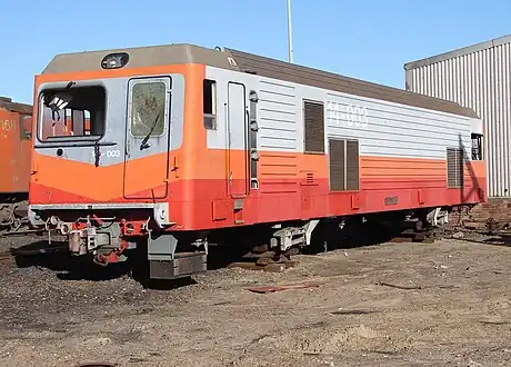 No. 14-003 without bogies, parked on rail sleepers at Bellville Depot, 18 July 2009