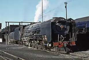 NBL-built ex condenser no. 3464 with a Worshond tender, De Aar, 6 April 1979