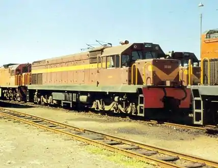 No. 33-203 in SAR Gulf Red and whiskers, Cambridge depot, East London, 26 December 1996