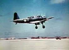 An SB2U-3 of VMSB-241 taking off