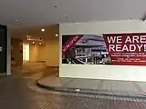 Signage near the lobby of One World Hotel announcing the opening of the link to the station.