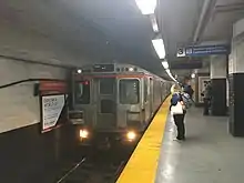 A Broad Street Line local train bound for NRG station arriving at City Hall station