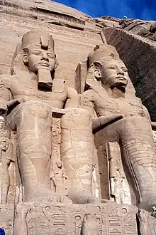 Image 91Four colossal statues of Ramesses II flank the entrance of his temple Abu Simbel (from Ancient Egypt)