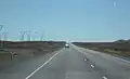 Travelling north on SH 1 through the Rangipo Desert. This section is known as the Desert Road, and is frequently closed by snow in winter.