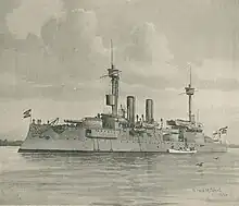 A large gray warship with two tall masts and two thin smoke stacks sits motionless offshore