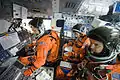 Crew inside Space Shuttle mock-up during training (Pictured (L to R): Doug Hurley, Sandra Magnus, and Rex Walheim)