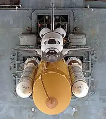 Space Shuttle Atlantis  atop an MLP (and crawler beneath)