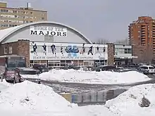 Exterior photo of arena during a snowy winter