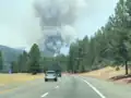 A smoke plume as seen on the west side of the fire as seen from I-5 on July 3, 2021