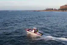 Drone image of a fishing boat off The Point area of Mossel Bay