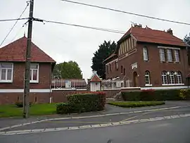 The town hall and school in Sancourt