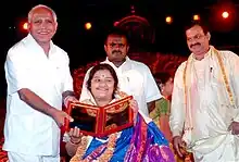 Katti Receiving Karnataka Rajyotsava Award in 2006 From CM & Deputy CM