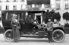 Catherine Palace at the main entrance, September 9, 1911. Adolphe Kégresse seated behind the wheel of the Imperial "Benz".