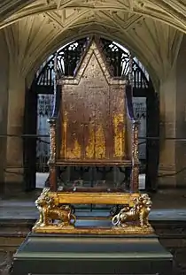 Image 44King Edward's Chair in Westminster Abbey. A 13th-century wooden throne on which the British monarch sits when he or she is crowned at the coronation, swearing to uphold the law and the church. The monarchy is apolitical and impartial, with a largely symbolic role as head of state. (from Culture of the United Kingdom)